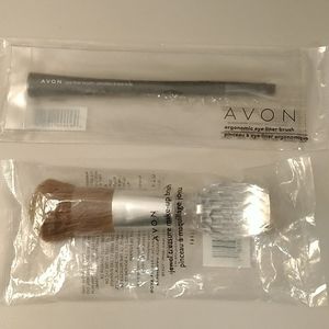 Two Avon makeup brushes